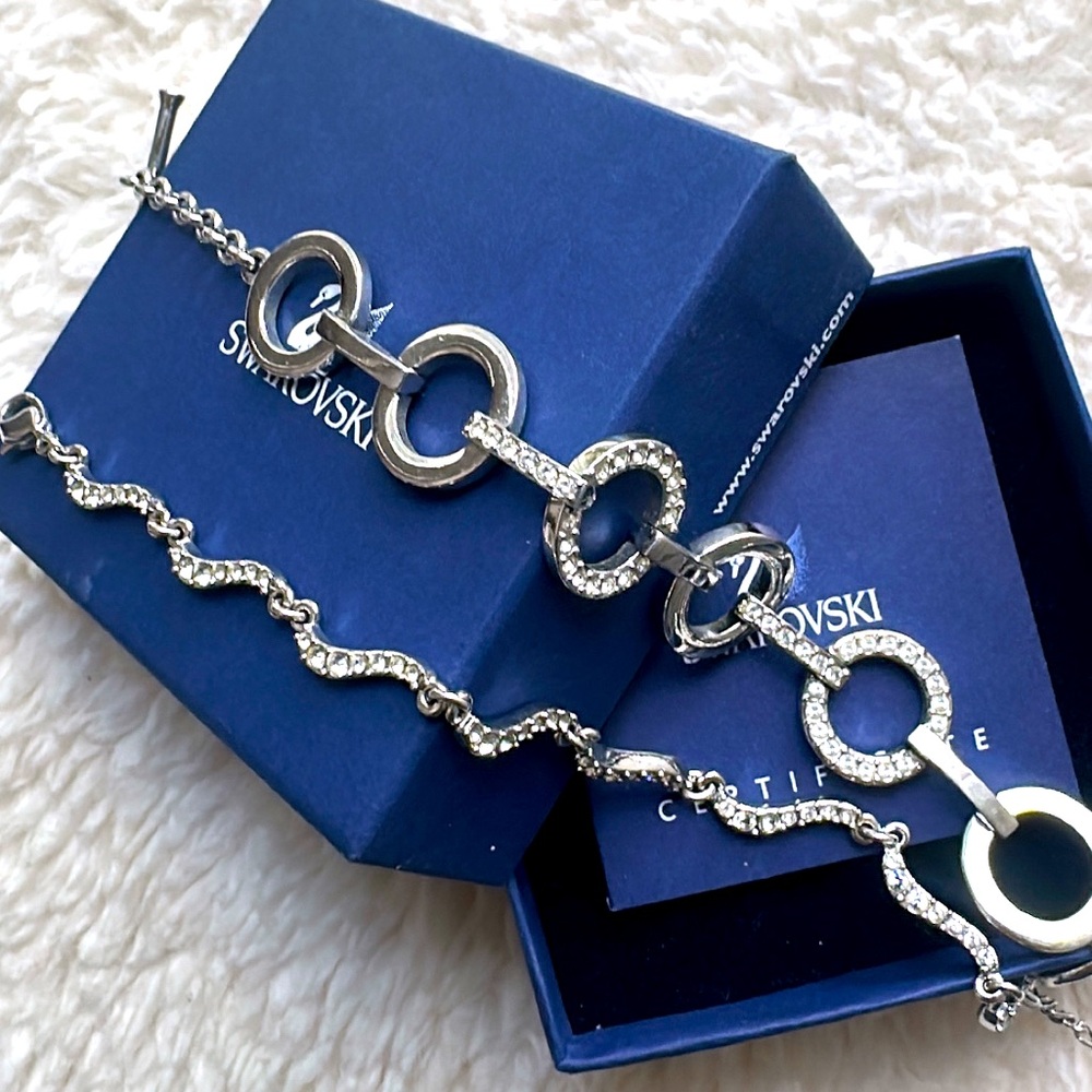 TWO Authentictic Swarovski Crystal brand bracelets. Come with Swarovski box.